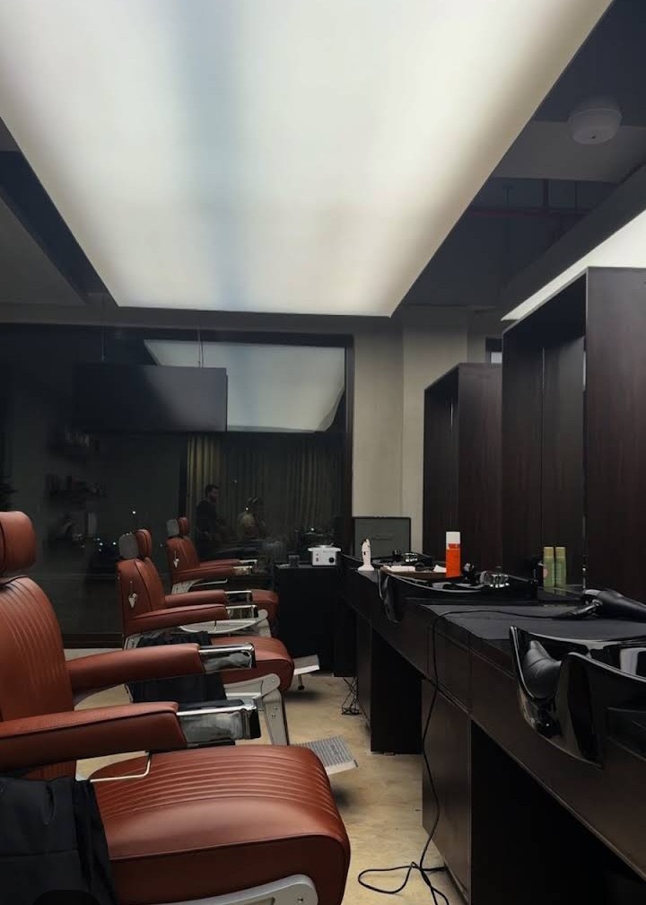 Chops Barbers signature oxblood leather barber chairs